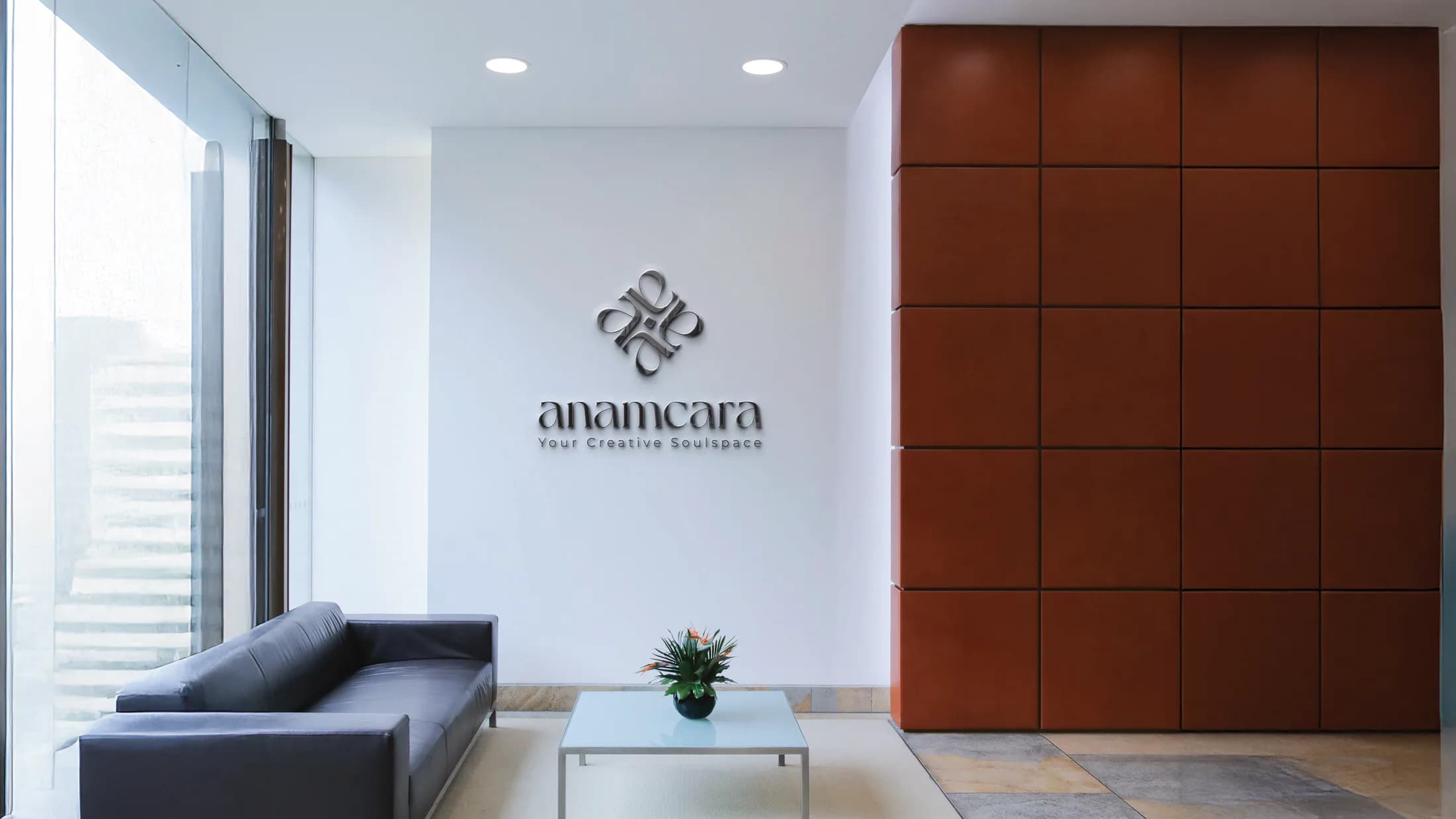 Anamcara signage in a warm wooden interior lounge