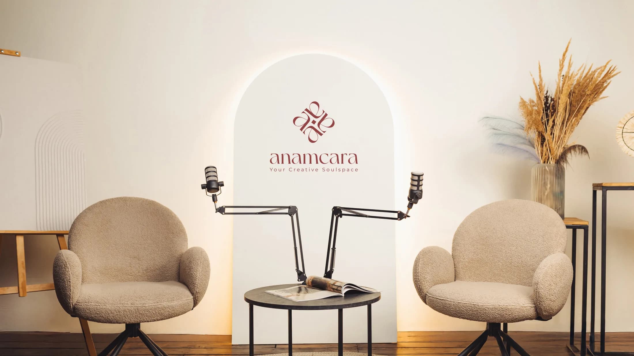 Podcast set with the Anamcara mark on an arched backdrop