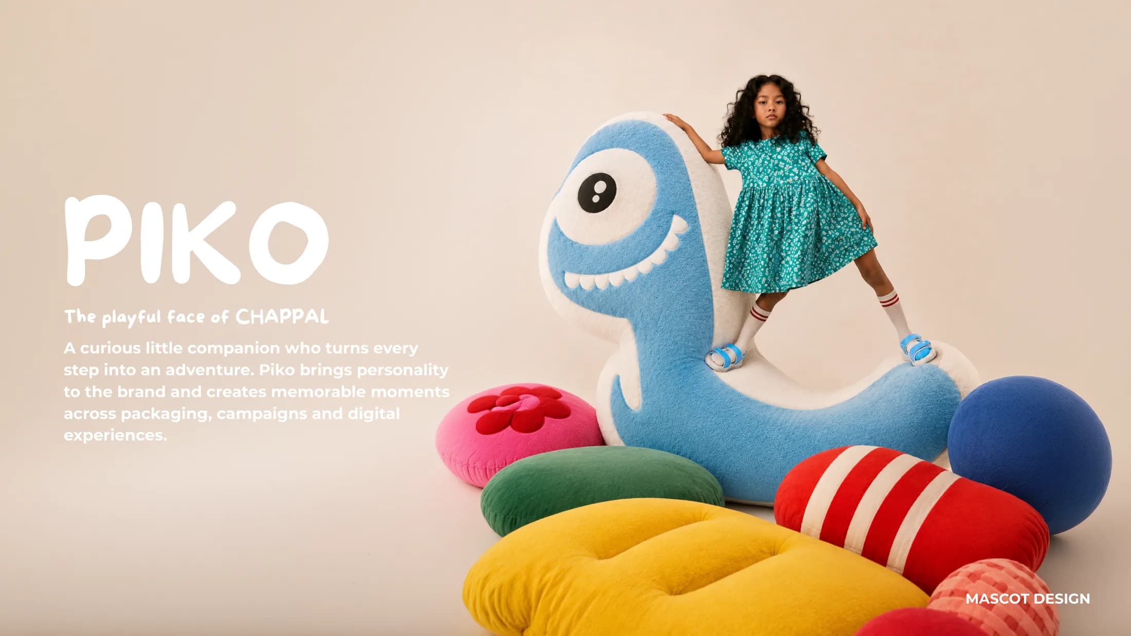 Piko the Chappal mascot as a plush toy beside a kid